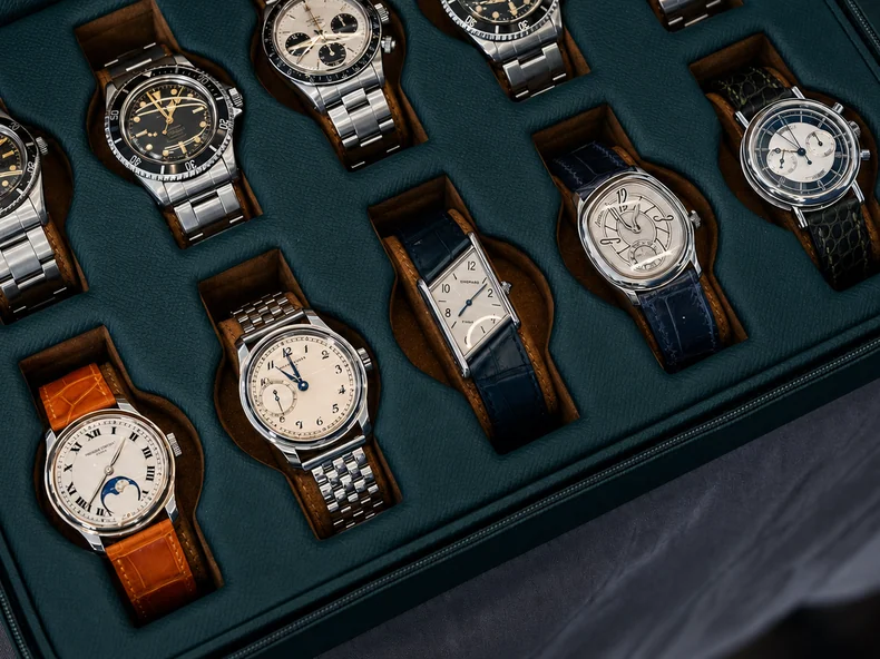 A collection of classic watches in its case